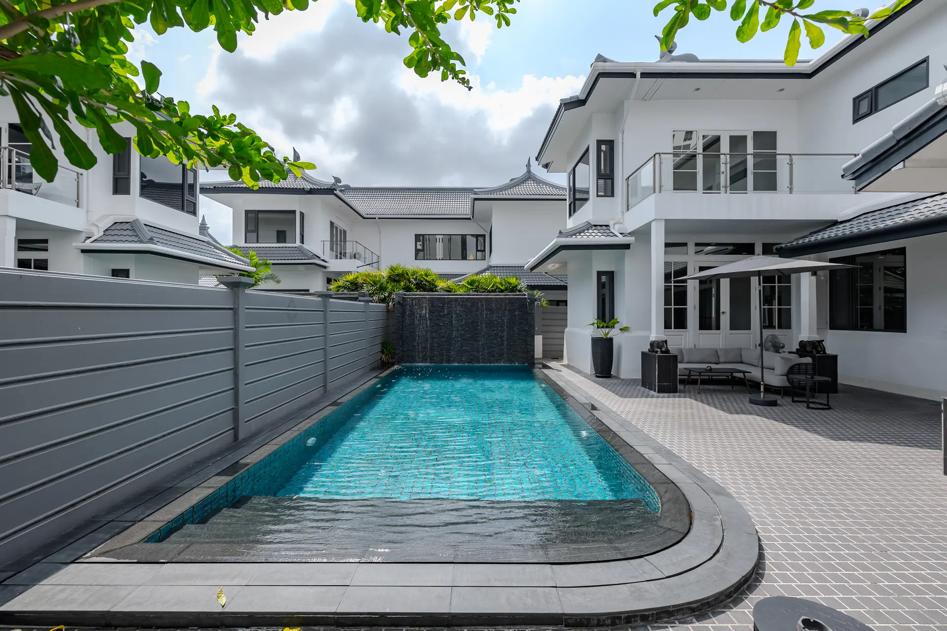 Private swimming pool in front of the two-storey house at Villa Sol, Thong Lo, Bangkok