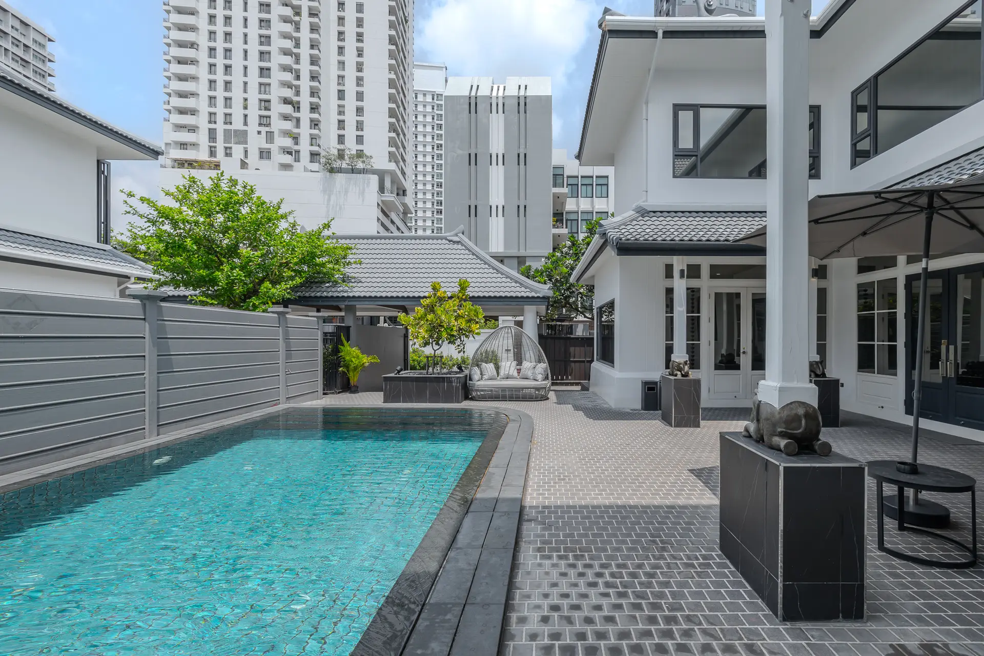 Private swimming pool and terrace at Villa Noir, Thong Lo, Bangkok
